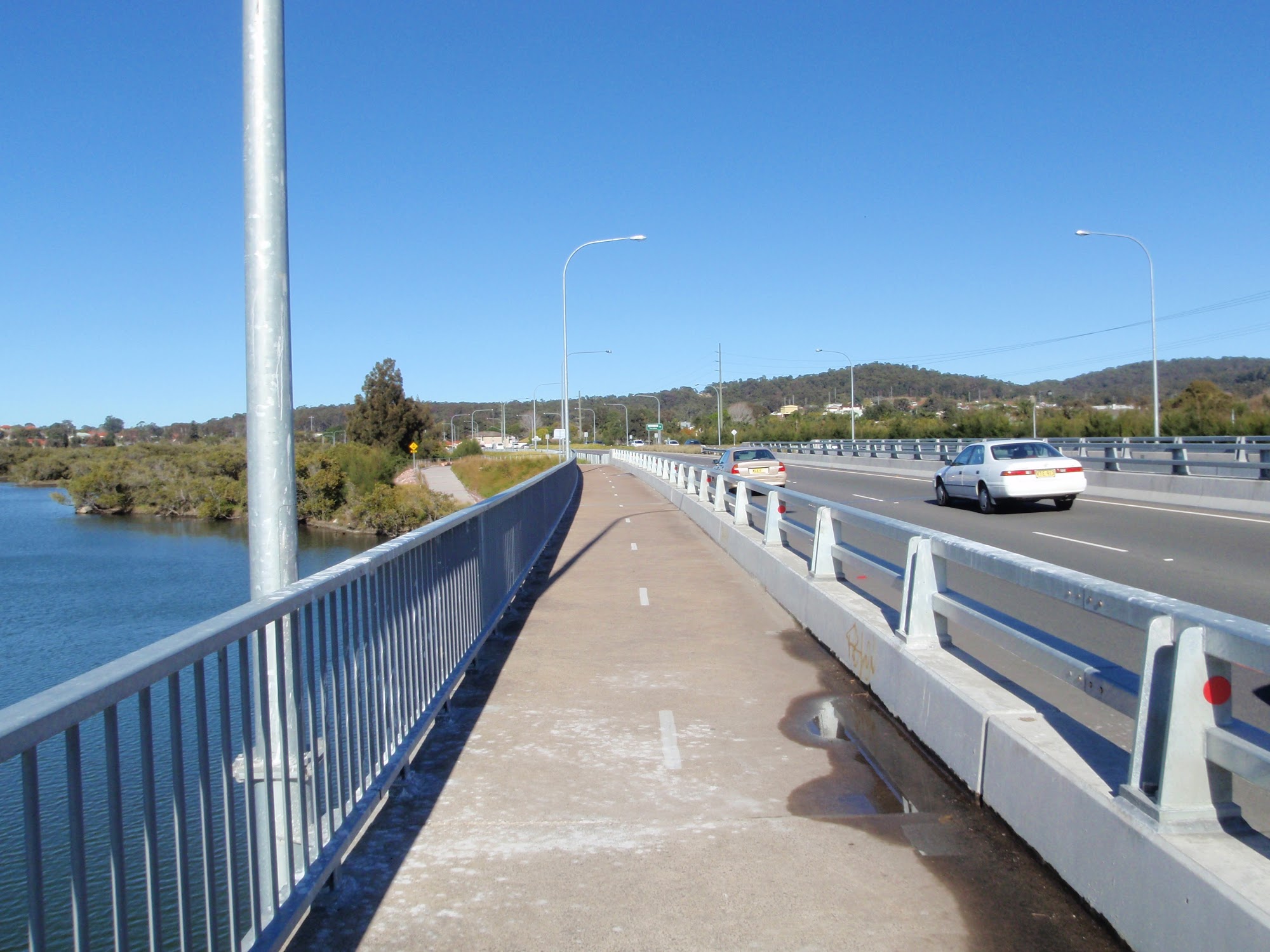 Walking next to Five Island Road looking at Cockle Creek